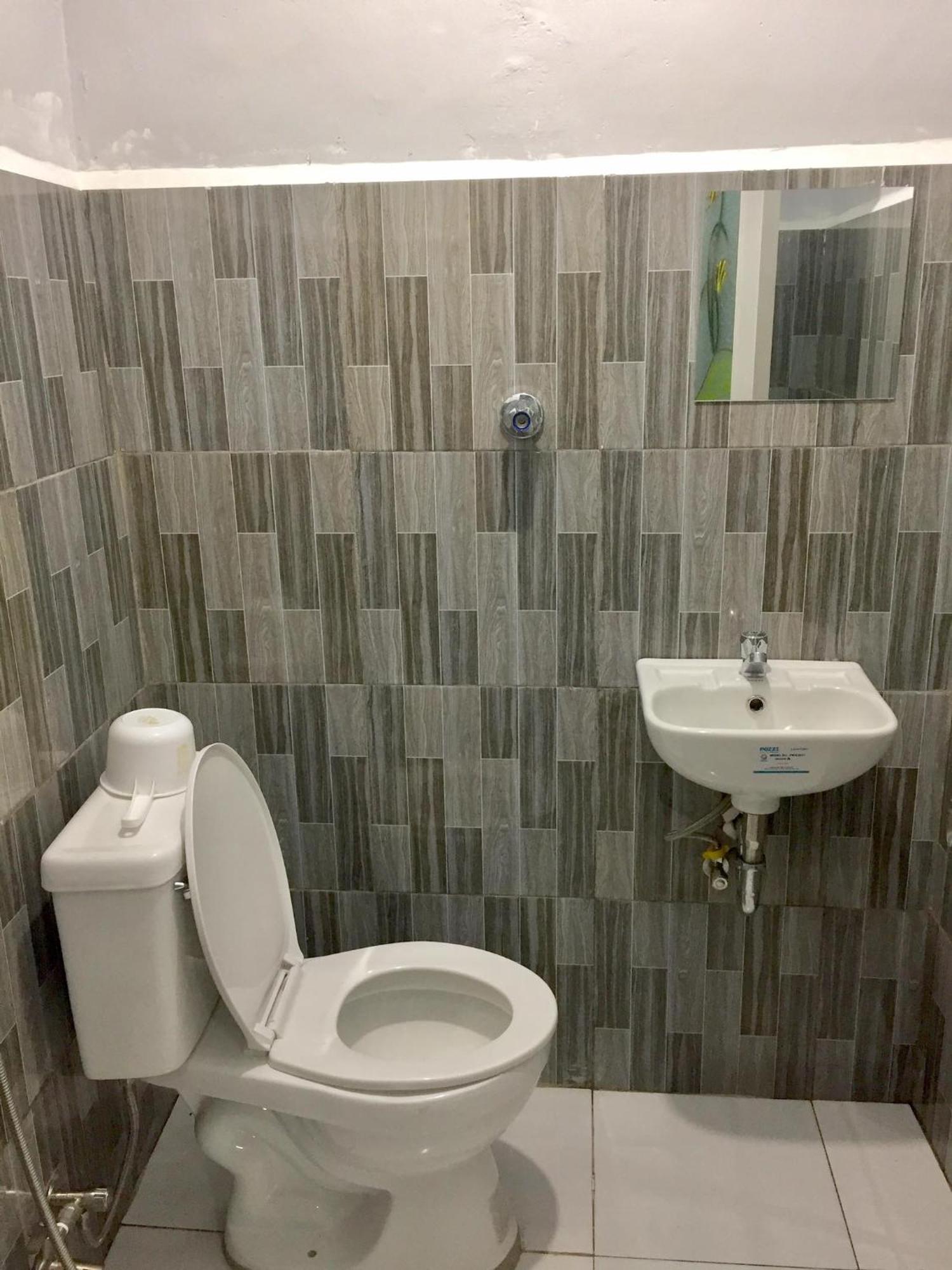 Ziet Hotel Mambajao Quarto foto