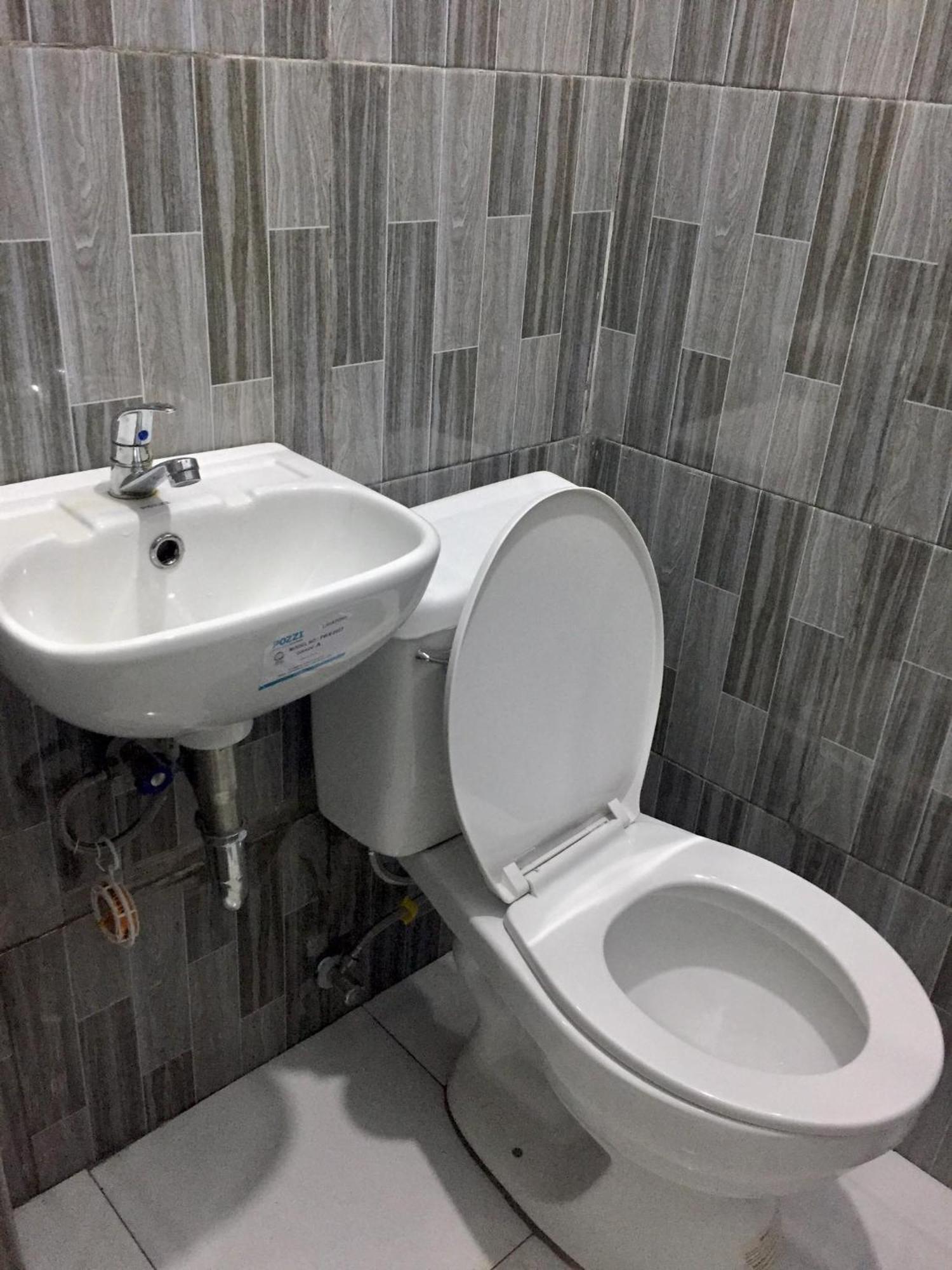 Ziet Hotel Mambajao Quarto foto